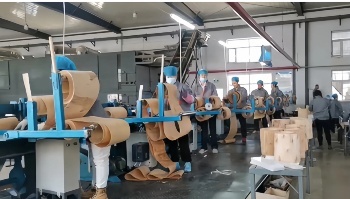 Automated rotary peeling and laser-calibrated punching process ensuring ±0.05mm thickness tolerance for wooden forks.